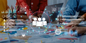 Market research services UAE featuring a business team analyzing market data, charts, customer insights, and performance metrics on a digital workspace.